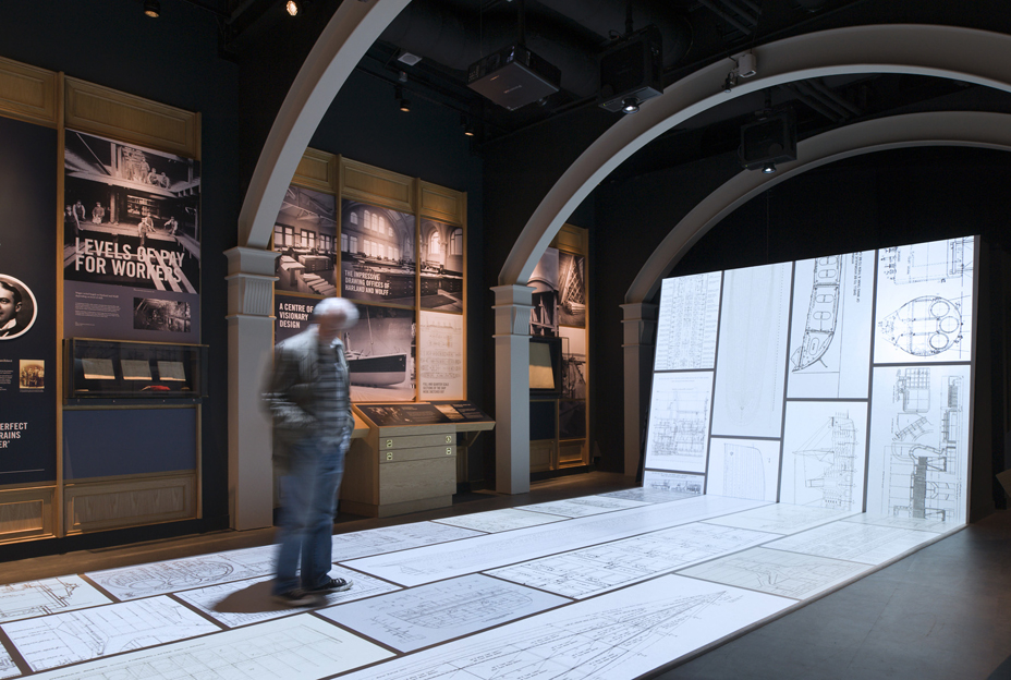 Immersive Drawing Board
A continuous floor to wall projected environment which uses motion tracking cameras and specially developed software to enable visitors to physically trigger a series of animated films and games based on the production drawings of the ship.